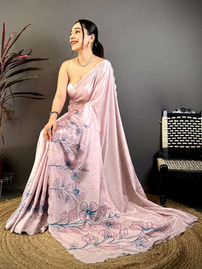 Elegant pink floral saree with embroidery and draped style for festive wear