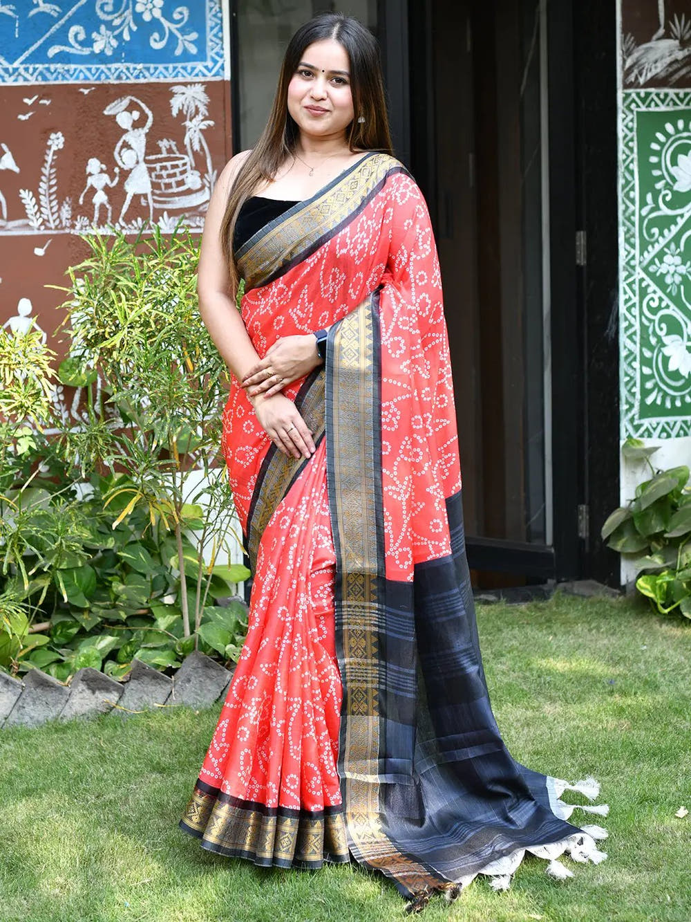 Traditional Bandhej print saree with rich Kanjivaaram border