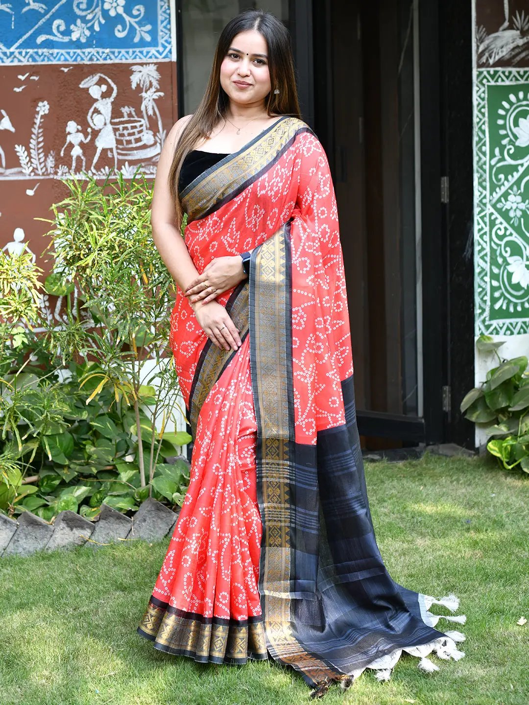 Traditional Bandhej print saree with rich Kanjivaaram border