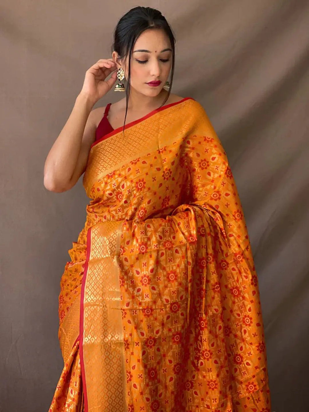 Elegant Mustard Yellow Patola Silk Saree with Zari Design