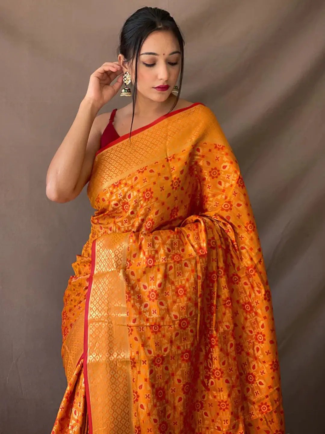 Elegant Mustard Yellow Patola Silk Saree with Zari Design