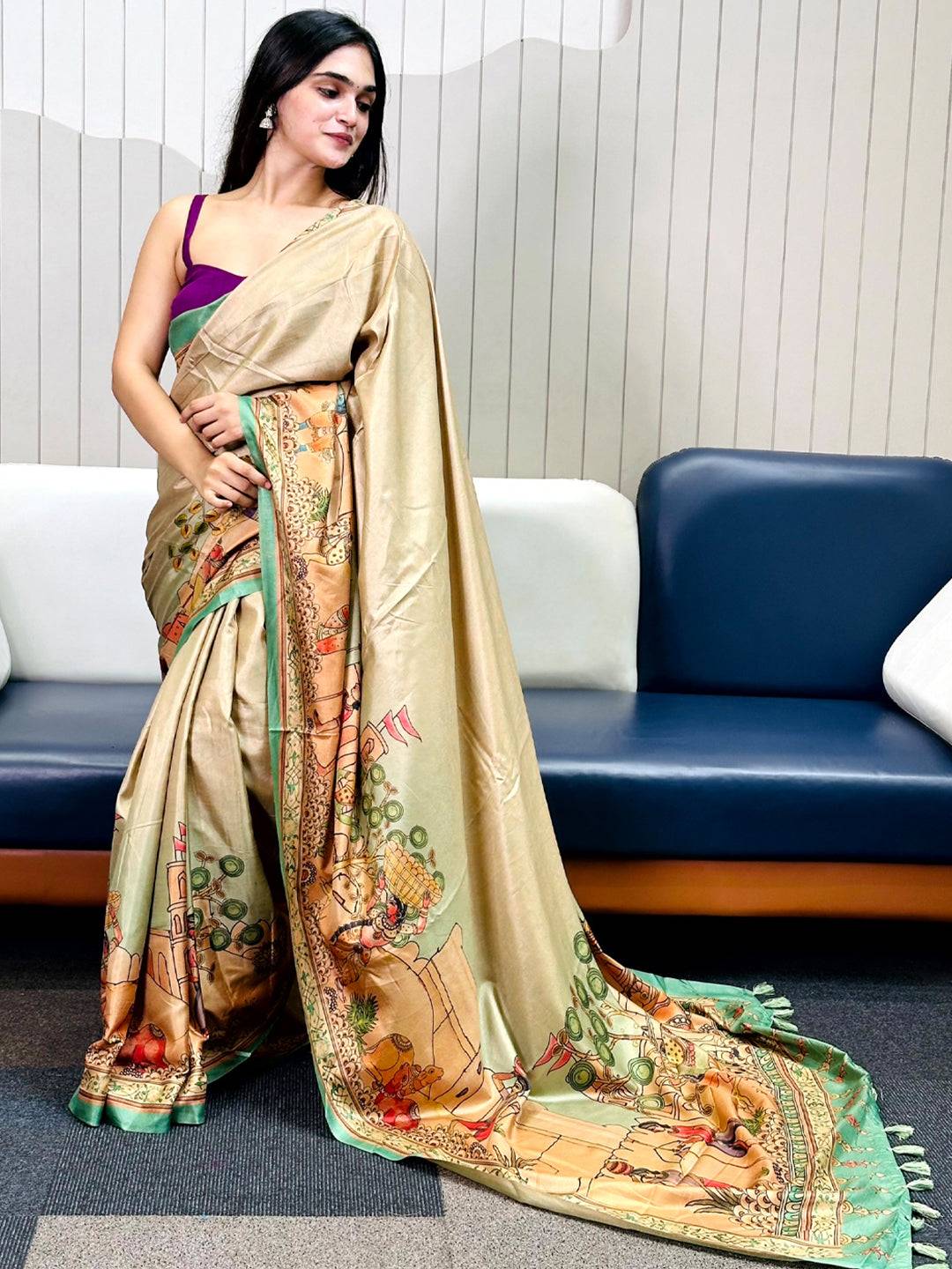 Woman showcasing Green Free Hand Kalamkari Print Saree with intricate designs.