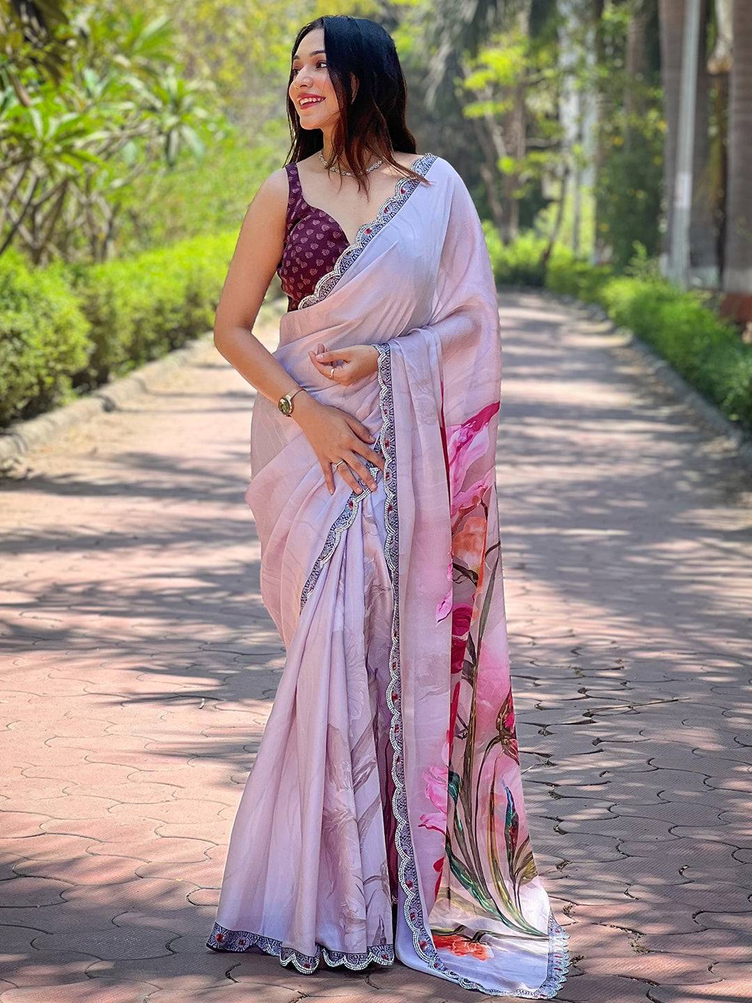 Model wearing grey satin georgette saree with floral design