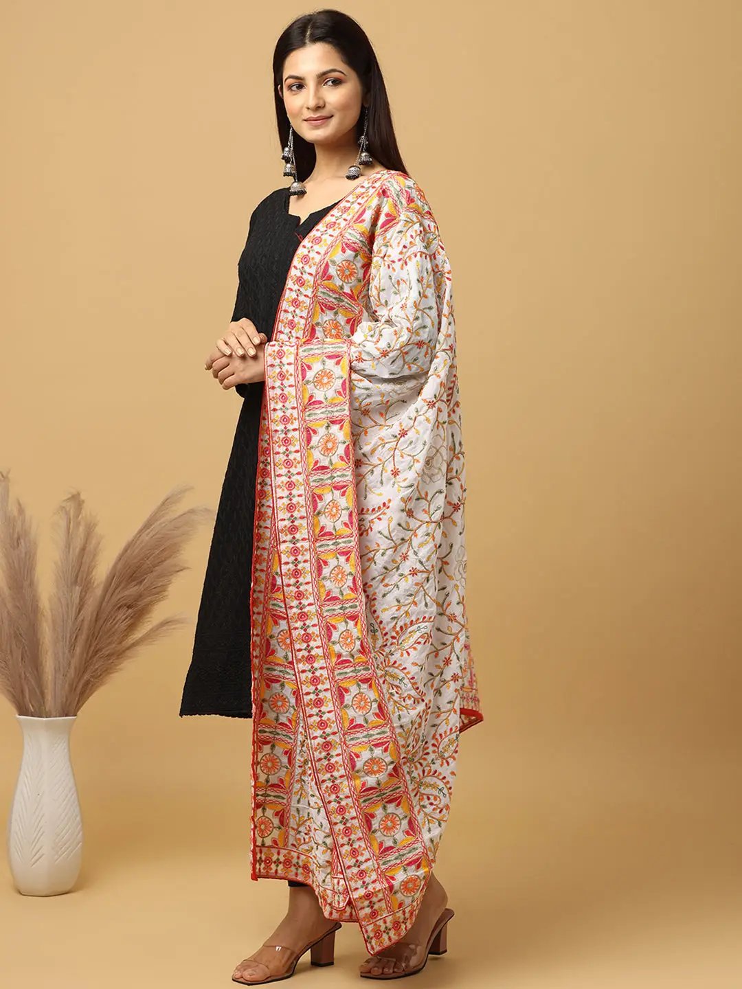 Elegant embroidered white dupatta with ethnic motifs