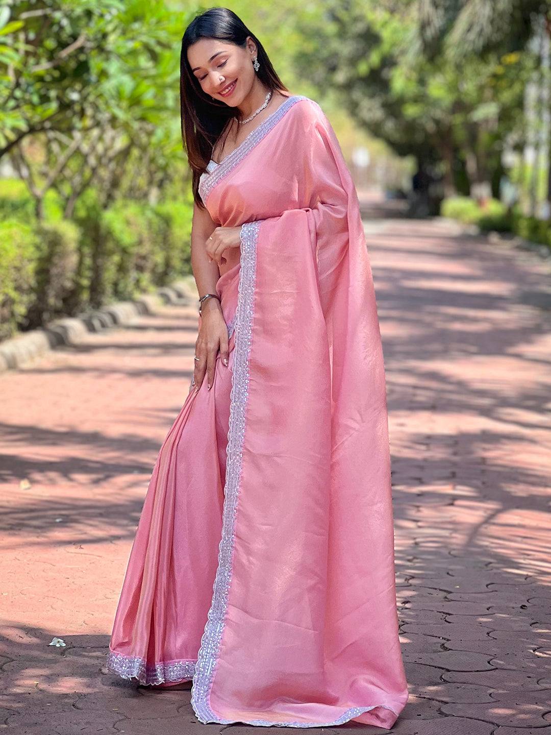 Model wearing Christa Pink Pure Viscose Saree outdoors