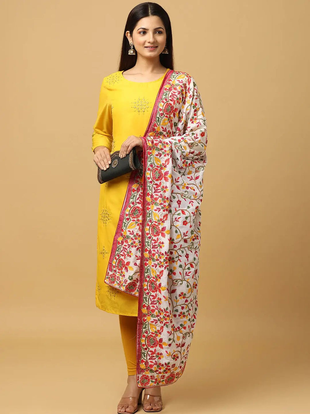 Model holding White Poly Chiffon Pashmina Dupatta with ethnic motifs