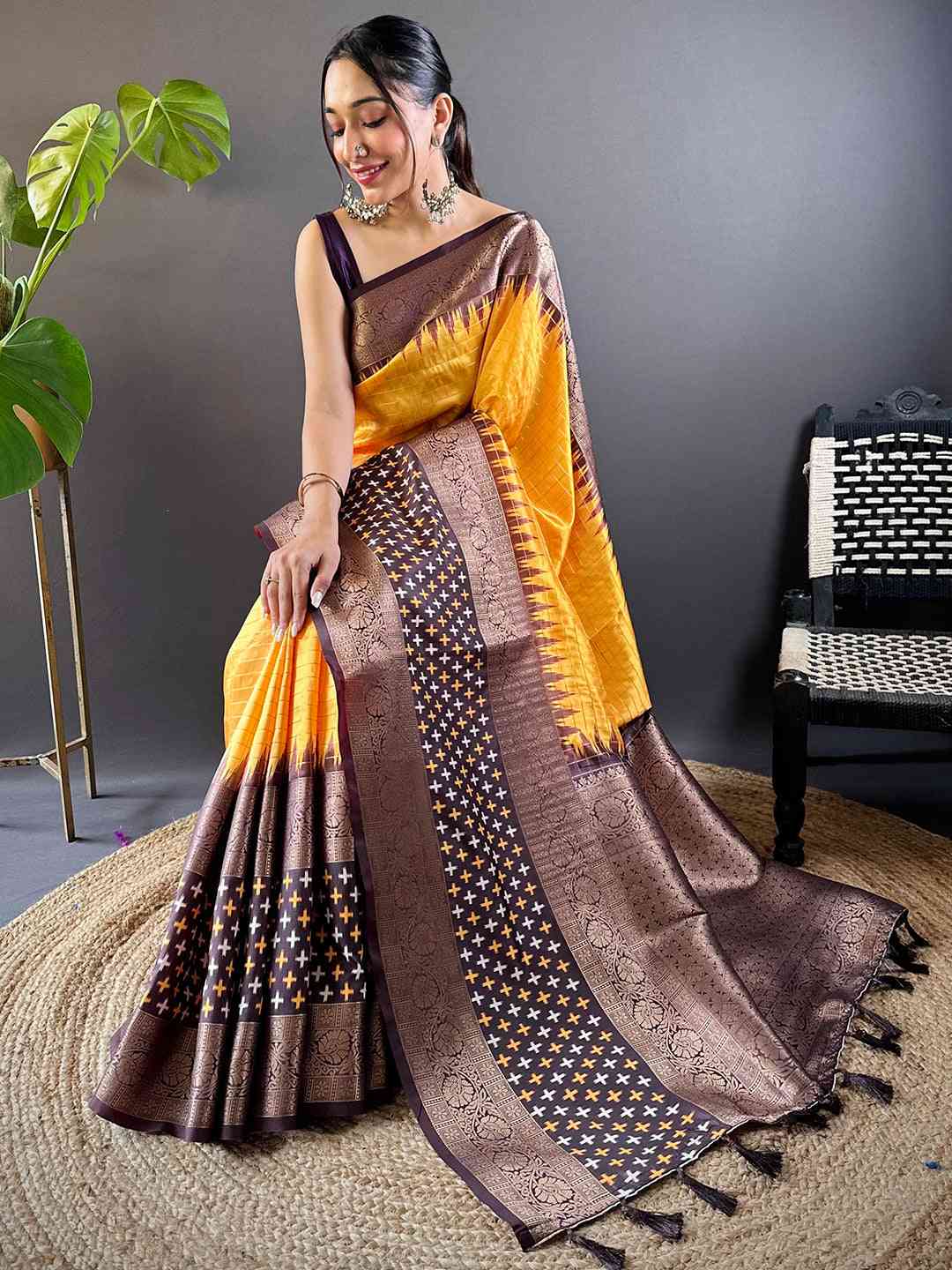 Stylish Yellow Chex Ikkat saree with rich double border
