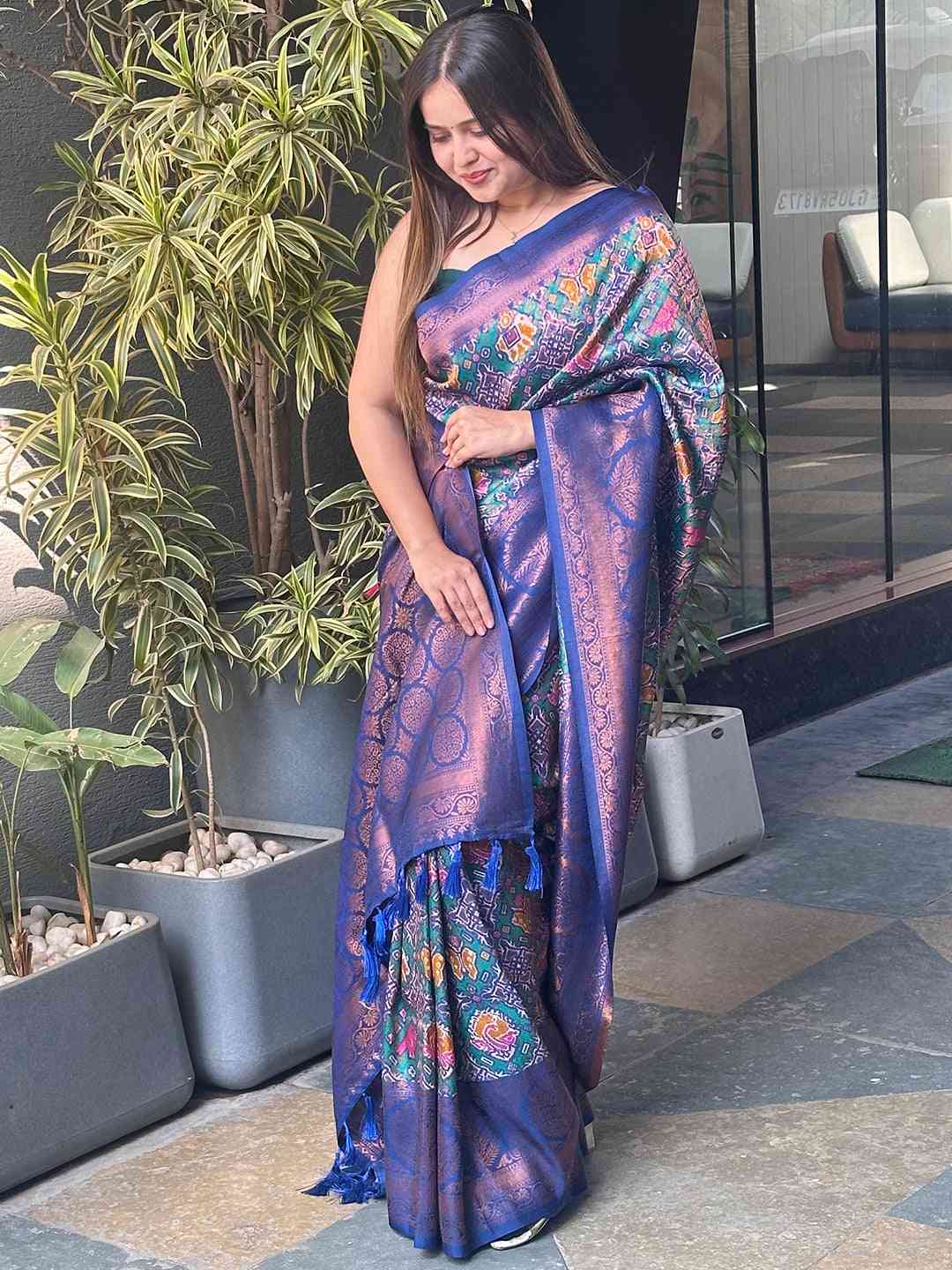 Elegant Teal Dola Silk Saree with Zari Patterns