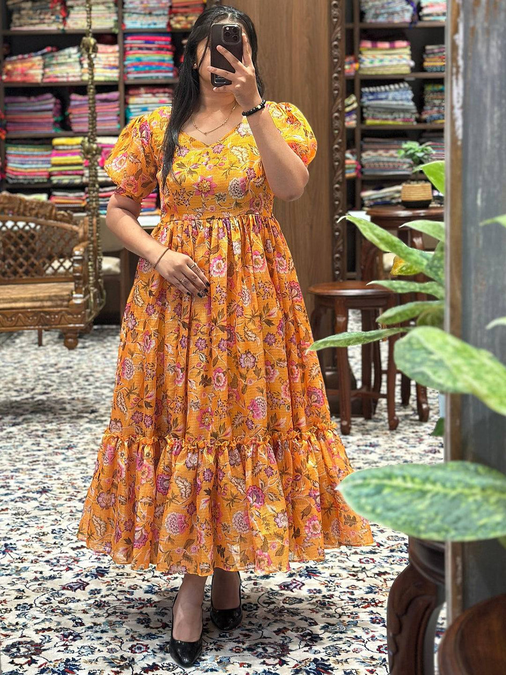 Elegant Sunset Yellow V Neck Midi Dress on display