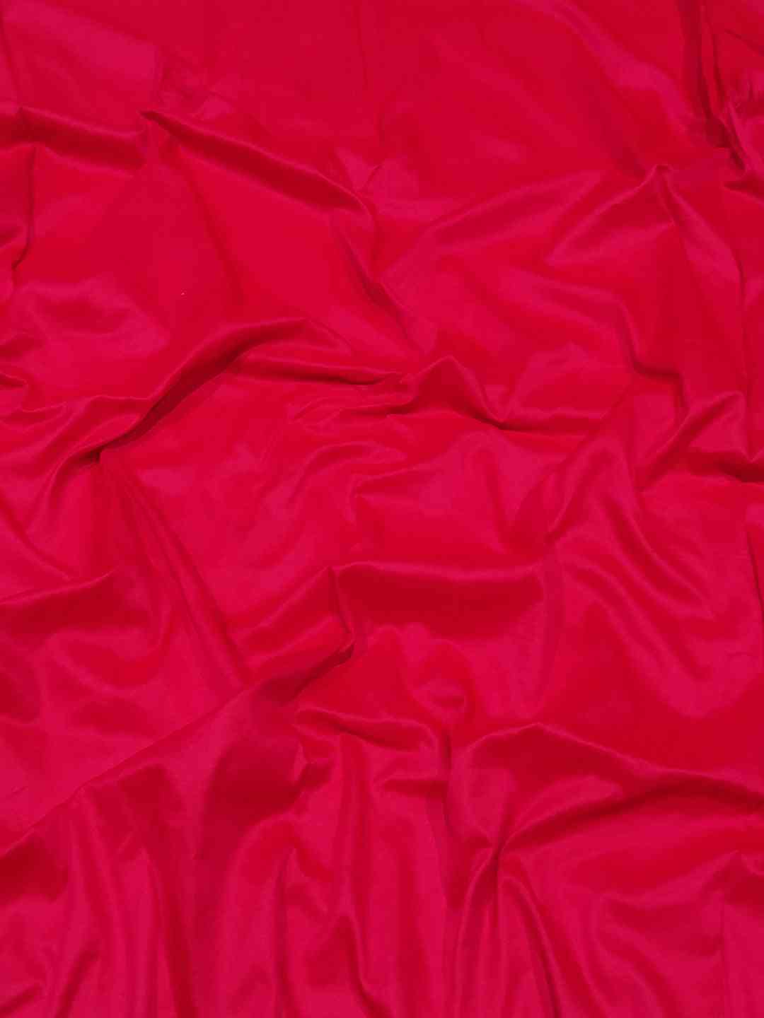 Vibrant pink silk fabric, smooth texture
