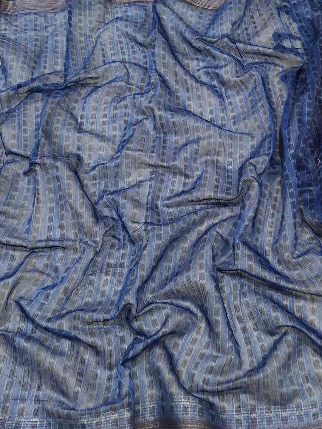 Blue patterned fabric of Floral Ikkat Saree