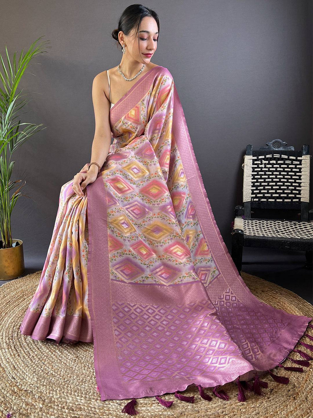 Sitting pose with Dusty Lavender Flower Vely Print Banarasi Saree.