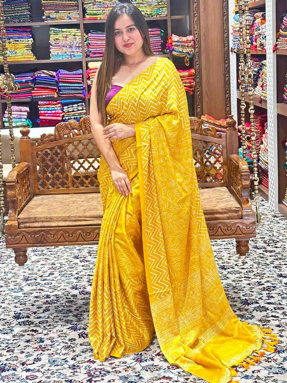 Elegant yellow Manipuri silk saree with intricate foil print design.