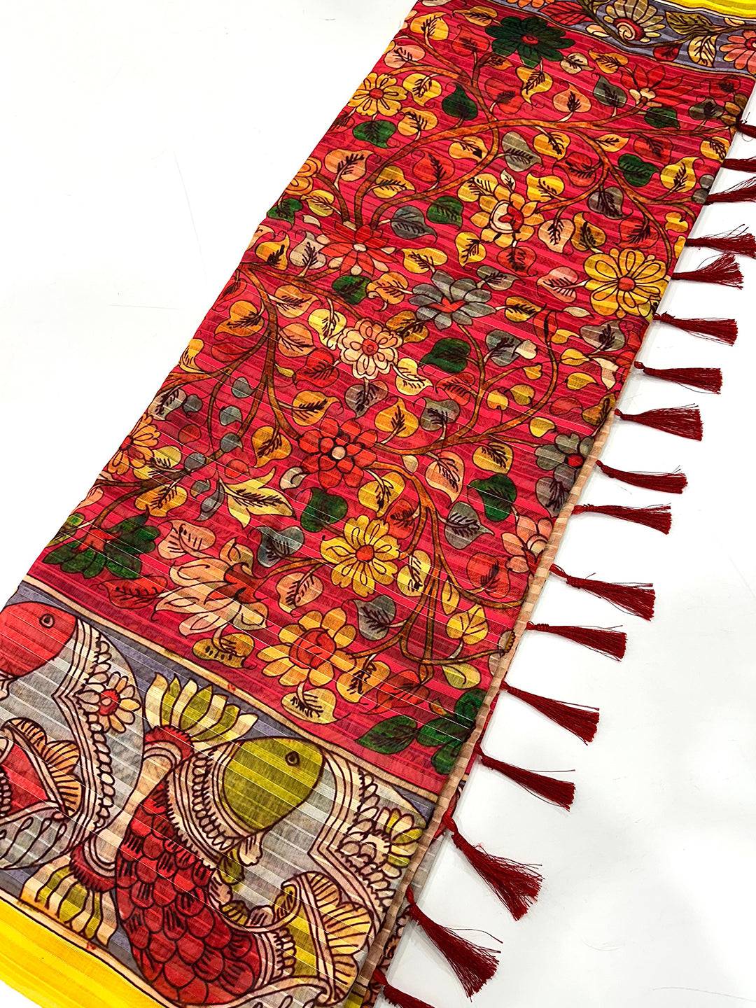 Detailed floral and fish pattern on saree
