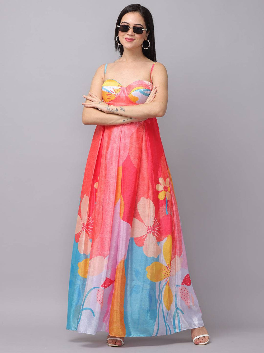 Model in rose pink sweetheart neck dress, arms crossed