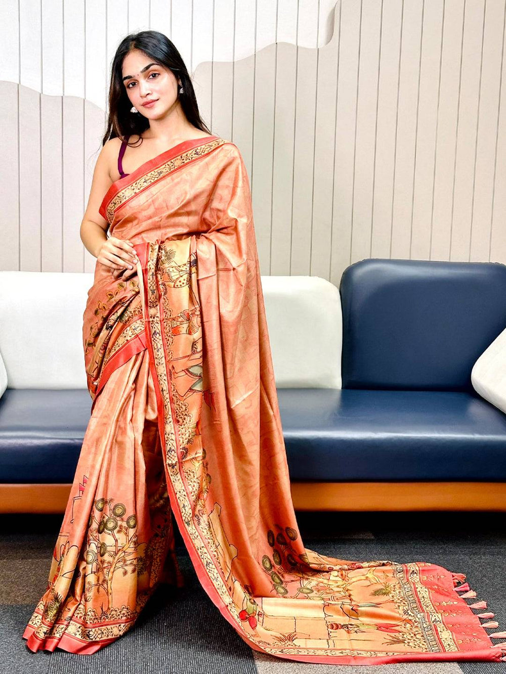 Model wearing Muvel Kalamkari Print Saree standing