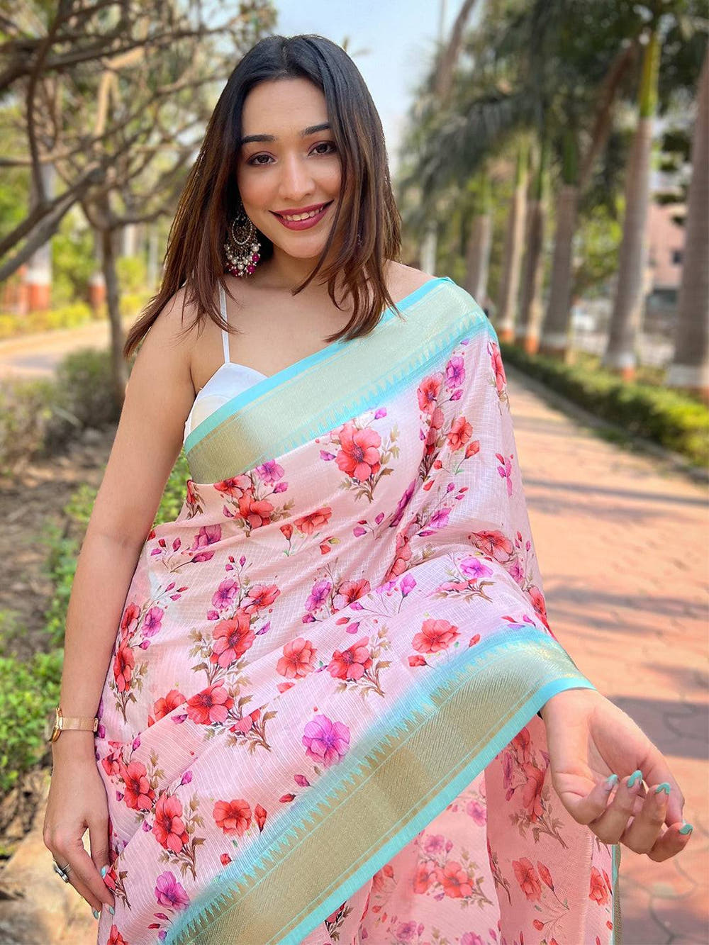 Close-up of Pink Kota Saree with vibrant floral print