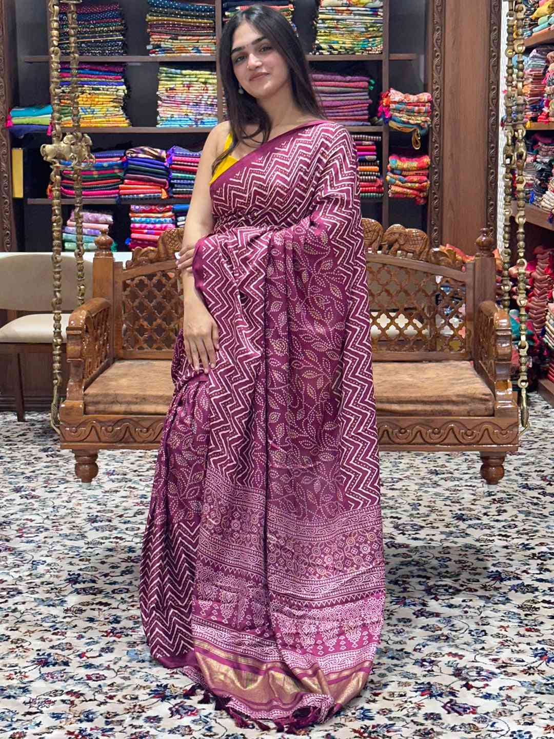 Stylish Burgundy Manipuri Silk Saree showcased in a boutique