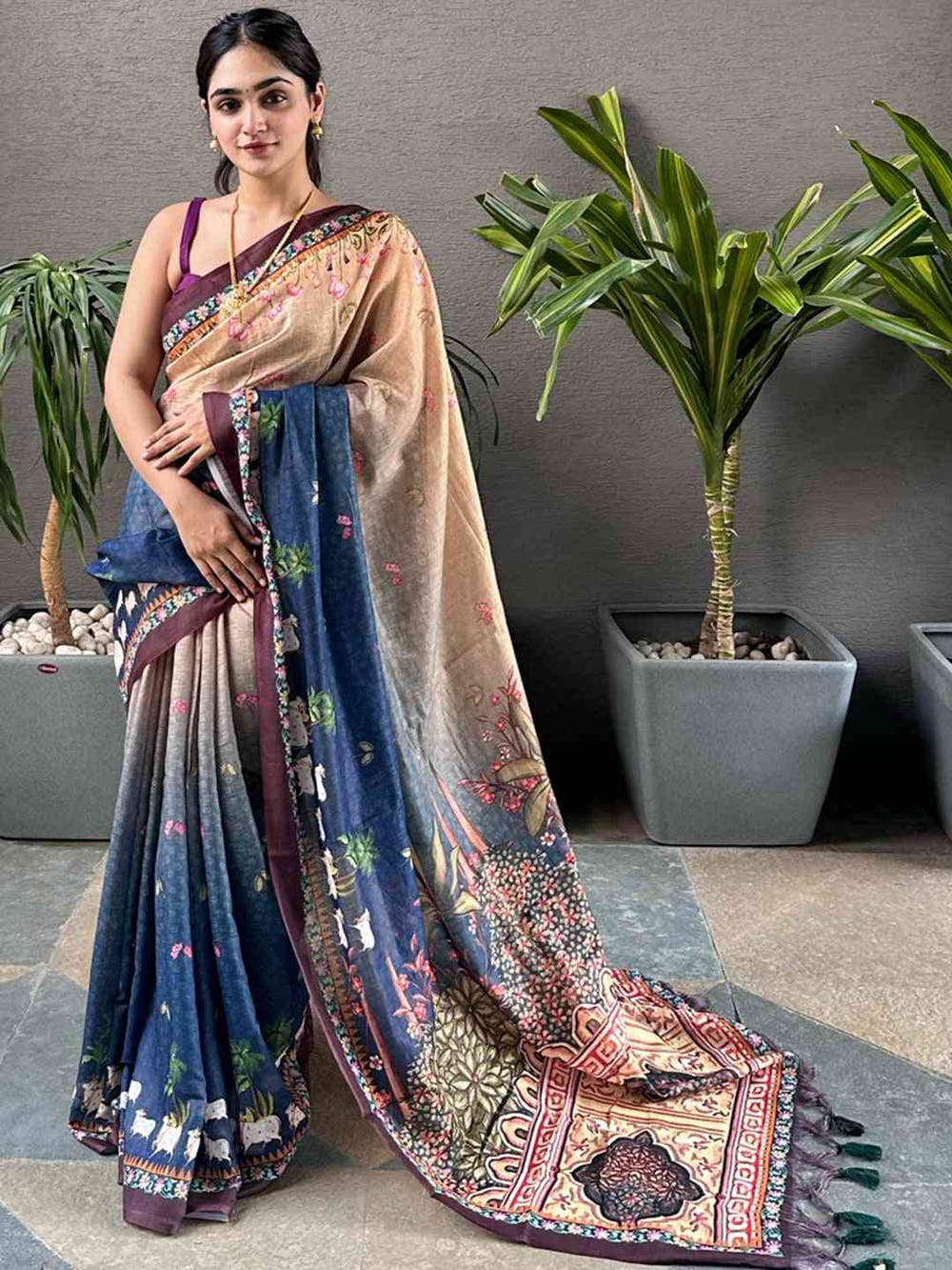 Elegant blue Pichwai saree with intricate designs