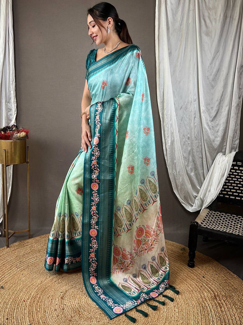 Model wearing Poppy Blue Kota Saree with rich Gadhwal Satin border