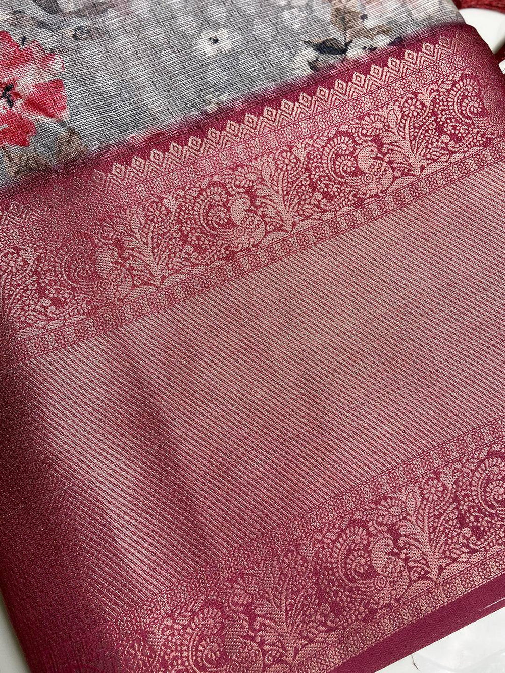 Pink Kanjivaram border on Grey Kota Doriya saree with floral design