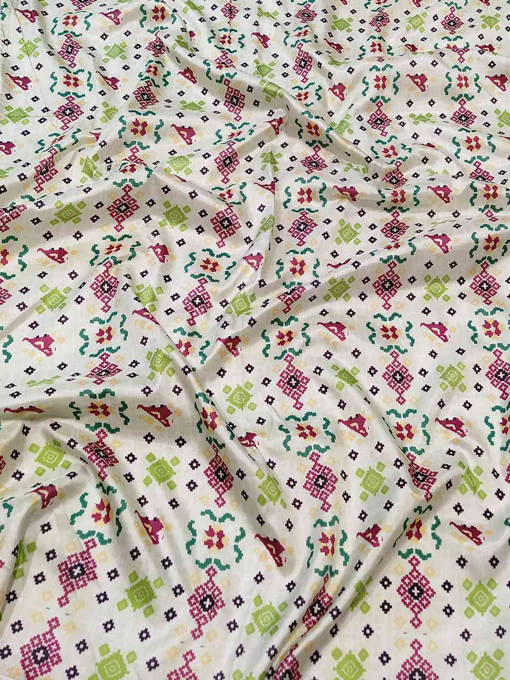 Close-up of Patola Print on Pista Colour Kanjivaram Saree
