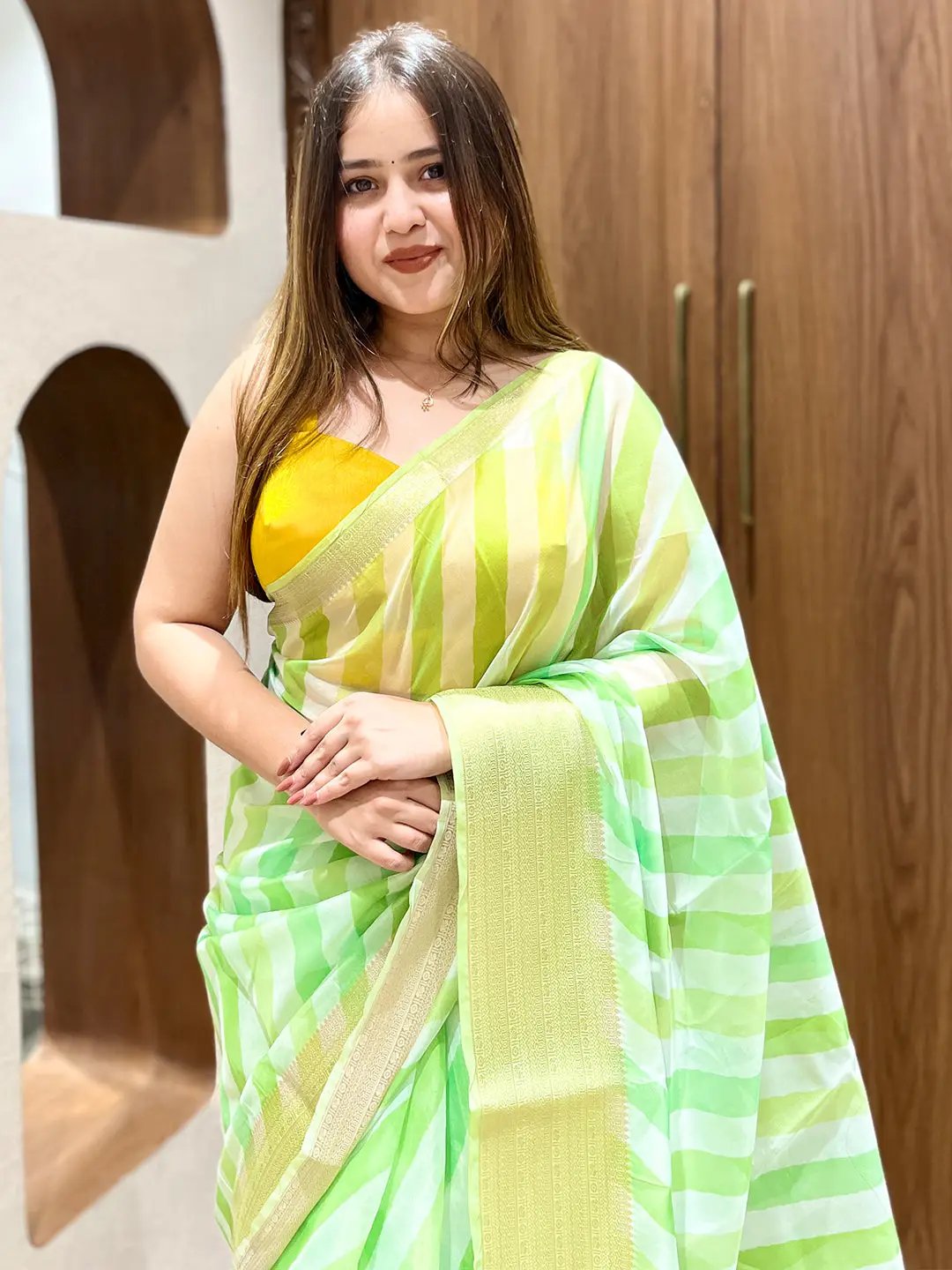 Soft organza leheriya saree in green and yellow stripes