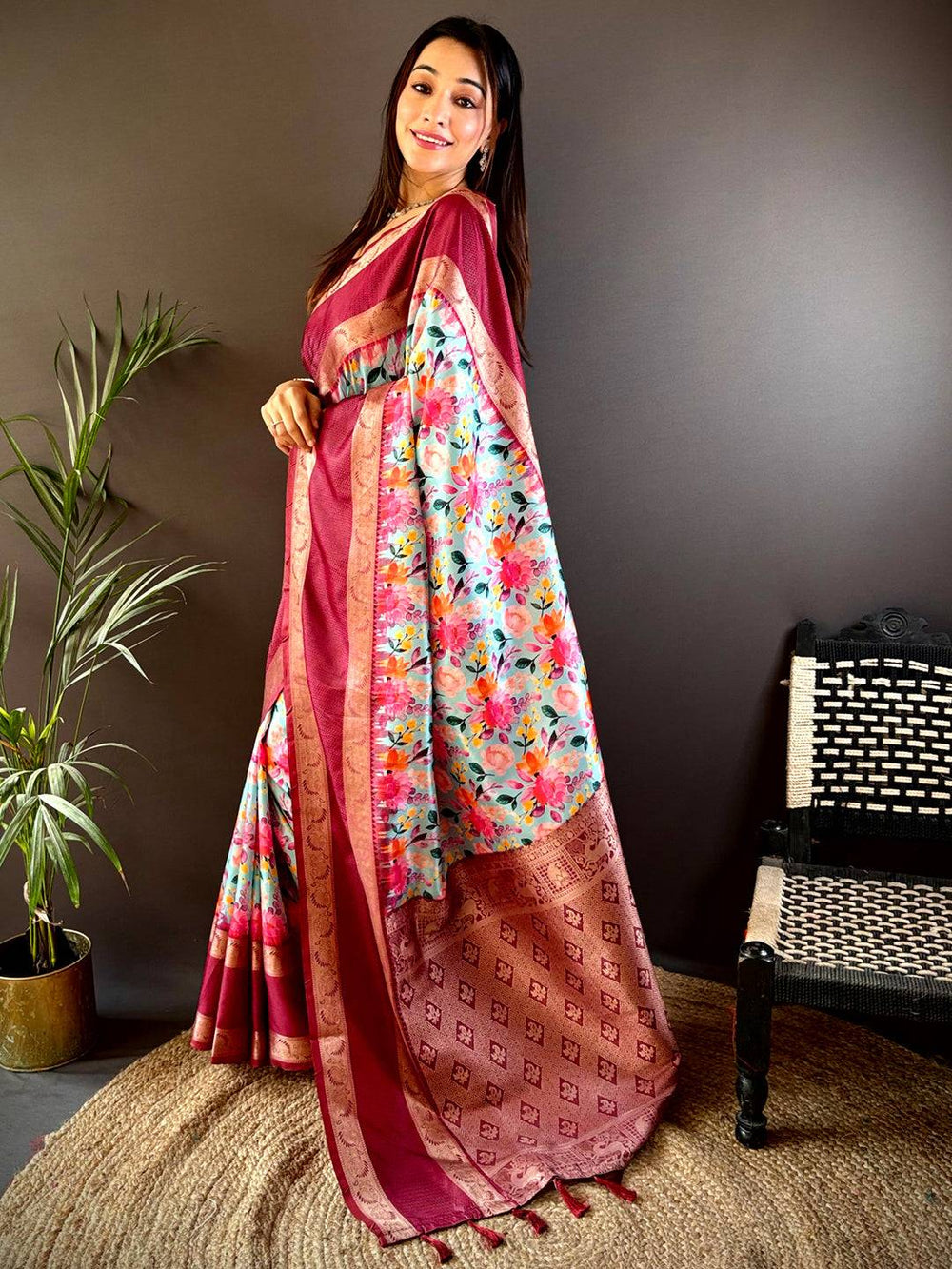 Model wearing Wine Banarasi Saree with Pallu design