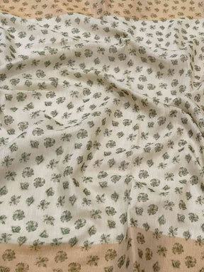 Close-up of Floral Elegance Linen Saree fabric pattern