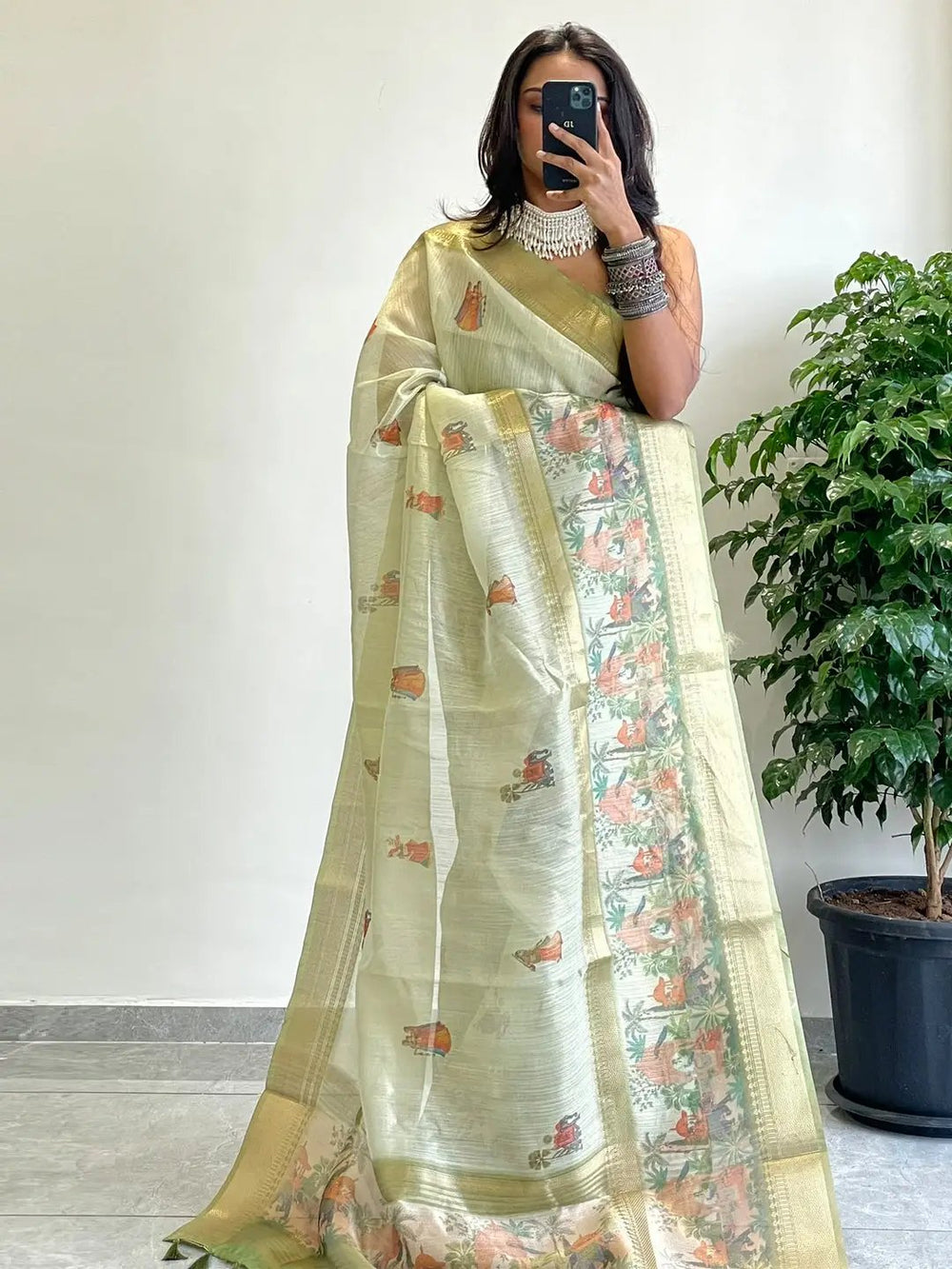 Elegant Soft Gold Zari Tissue Saree with intricate patterns