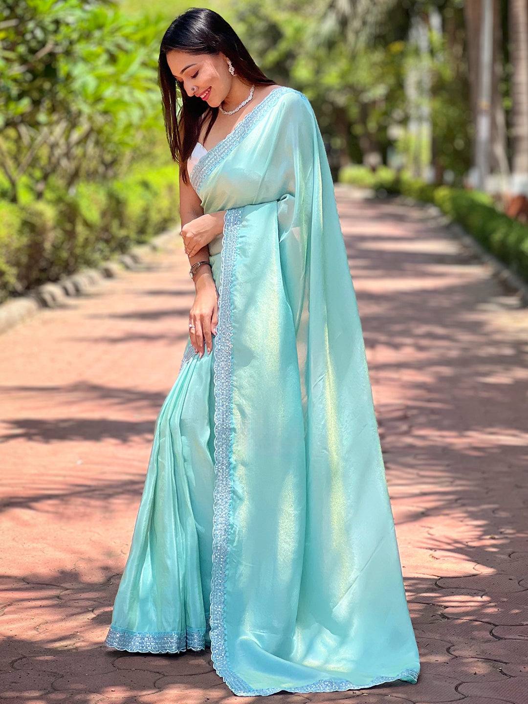 Elegant turquoise pure viscose dyed saree with detailed border