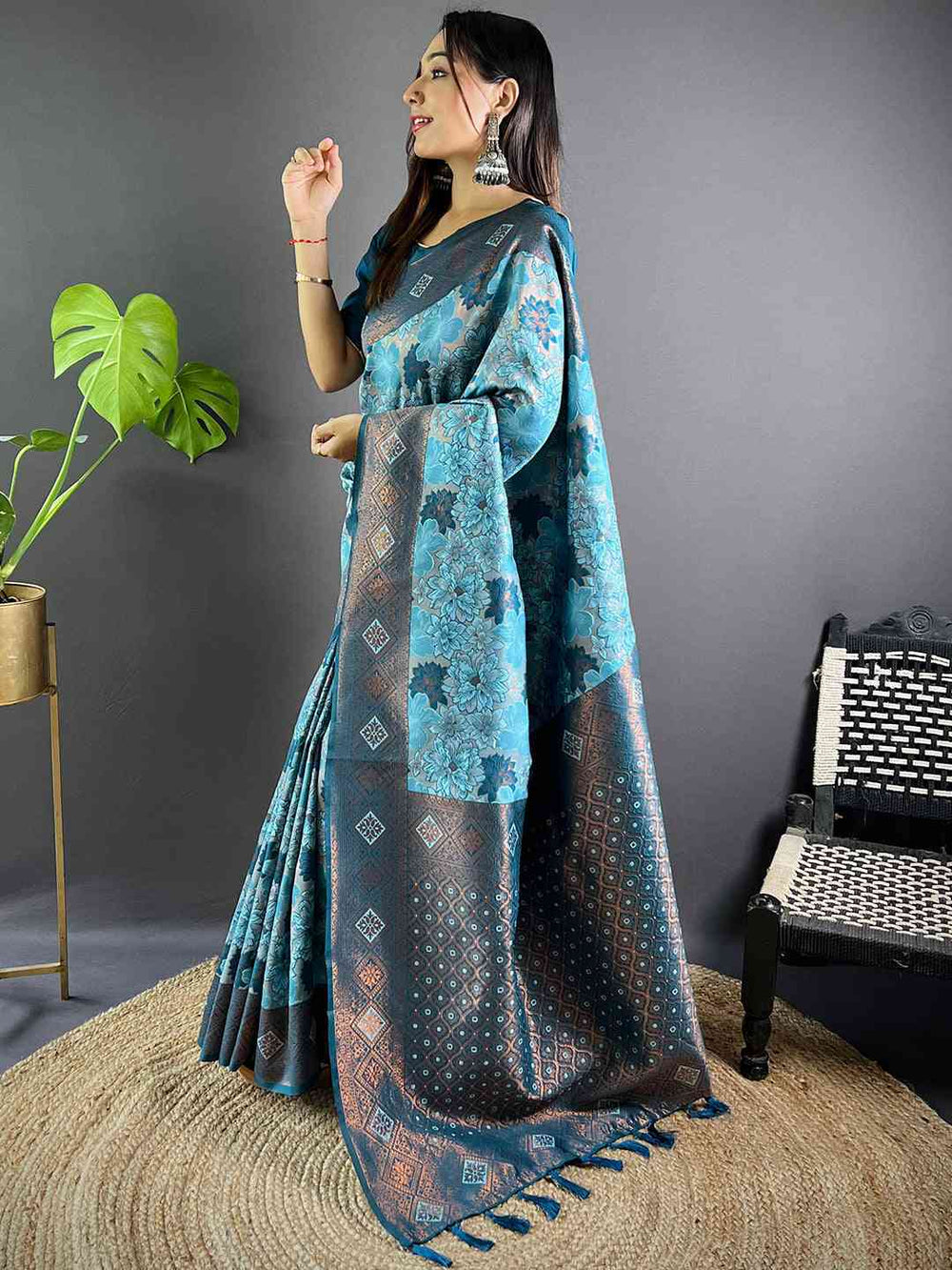 Model showcasing Sky Blue Soft Silk Butta Weaving Saree