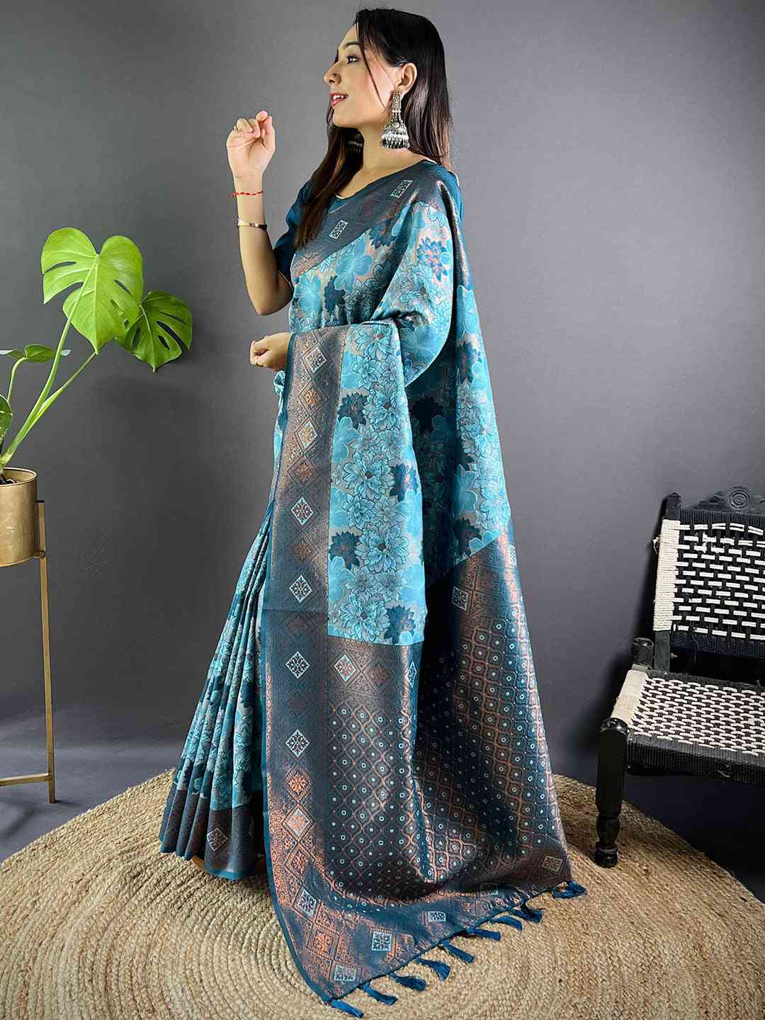 Model showcasing Sky Blue Soft Silk Butta Weaving Saree
