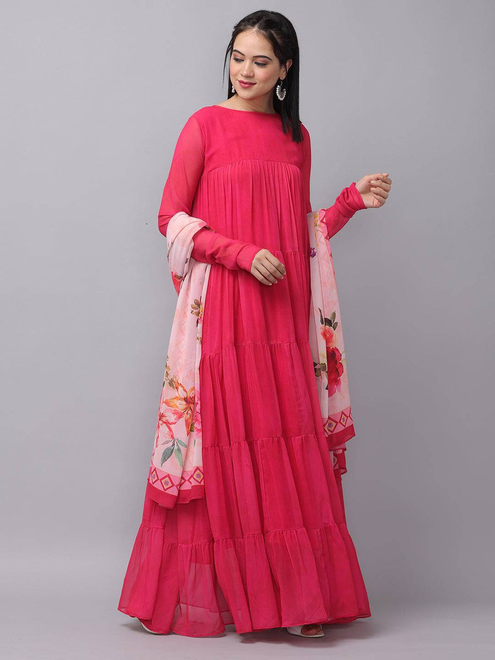 Side pose of Majestic Rani Colored Long Dress