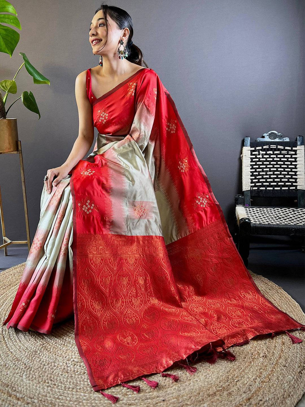 Seated model in Red Sami Banarasi Tussar Silk Saree