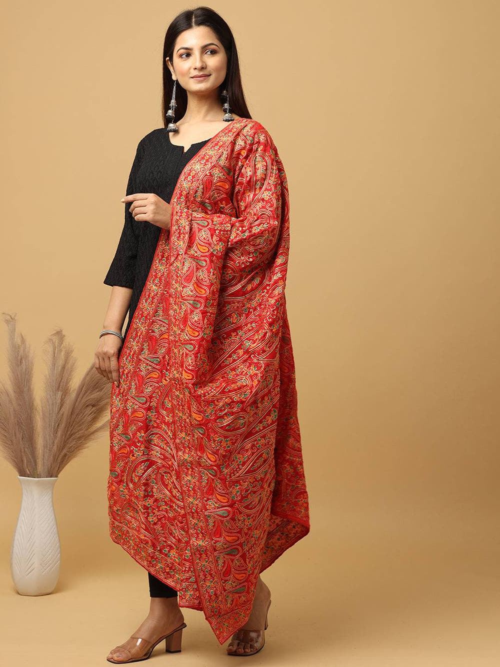 Model showcasing red poly chiffon pashmina dupatta