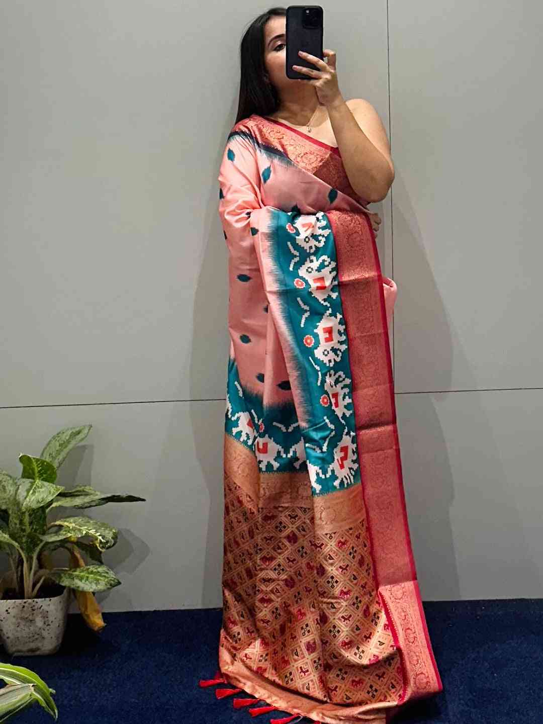 Chic Banarasi silk saree showcasing Zari Patola pallu