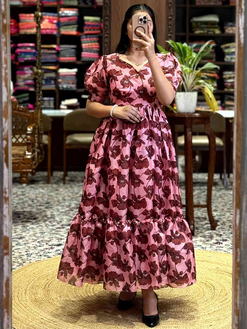 Elegant Baby Pink Floral Print Midi Dress featuring a flattering V-neckline and puff sleeves. A stylish choice available online at Vastranand.