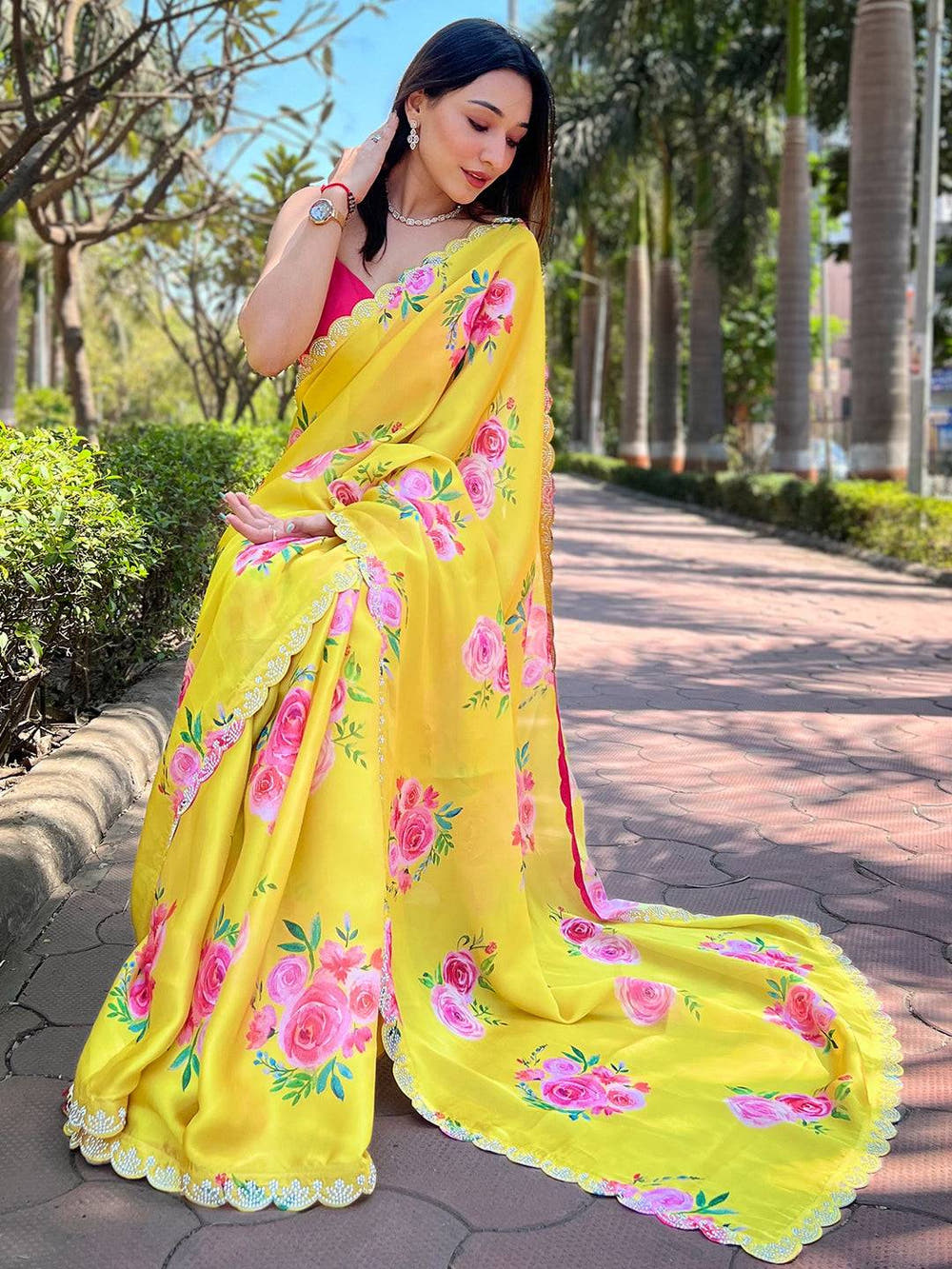 Satin georgette saree with floral pattern and zircon border