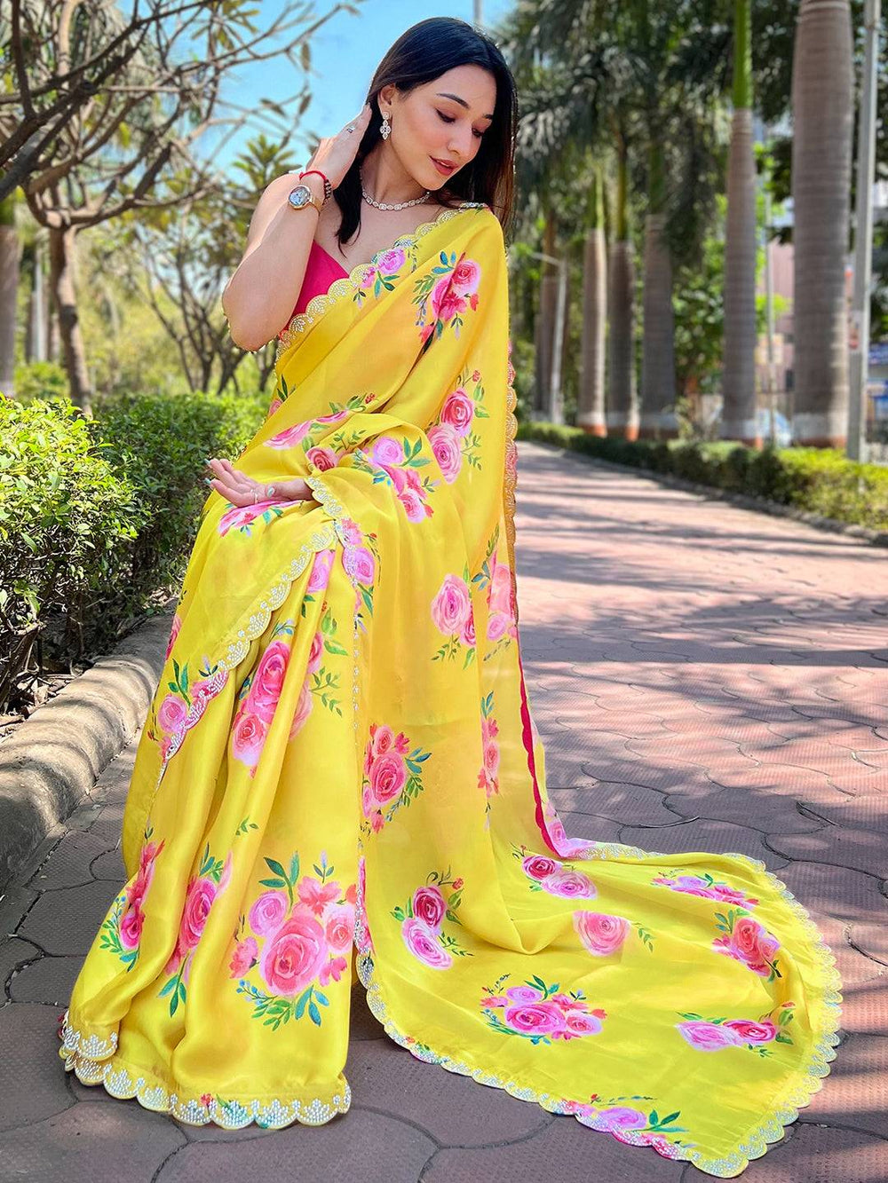 Satin georgette saree with floral pattern and zircon border
