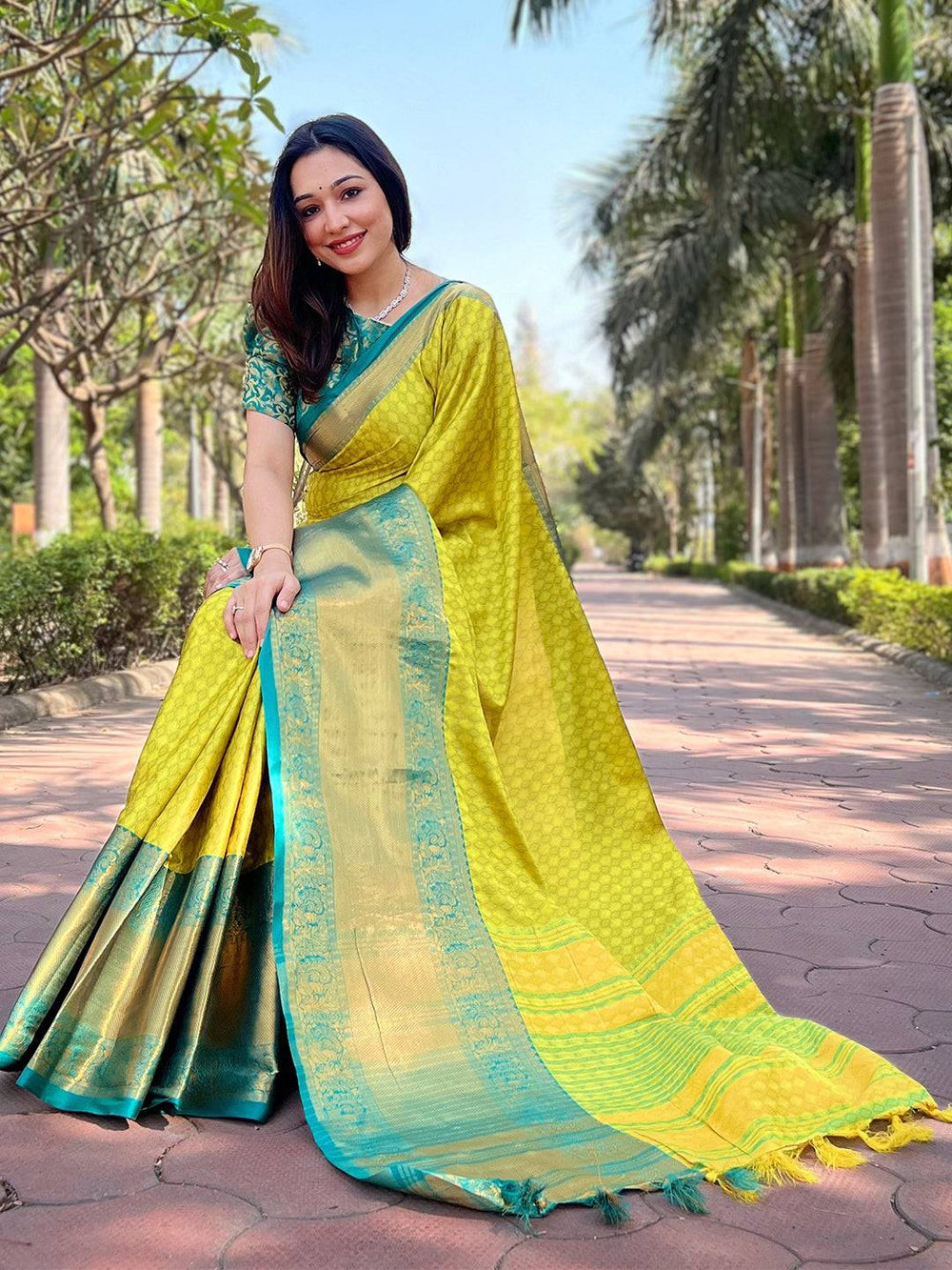 Lime Kanjivaram saree showcasing luxurious silk fabric