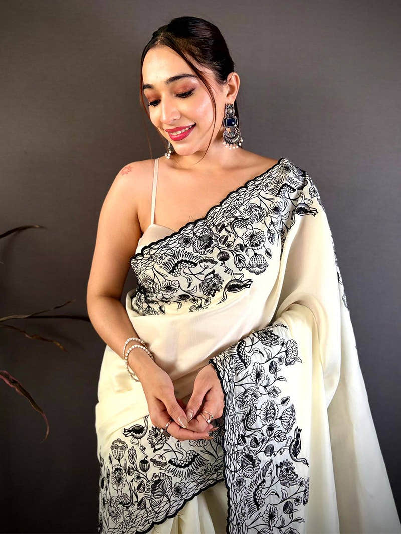 Elegant Half White Embroidered Border Saree