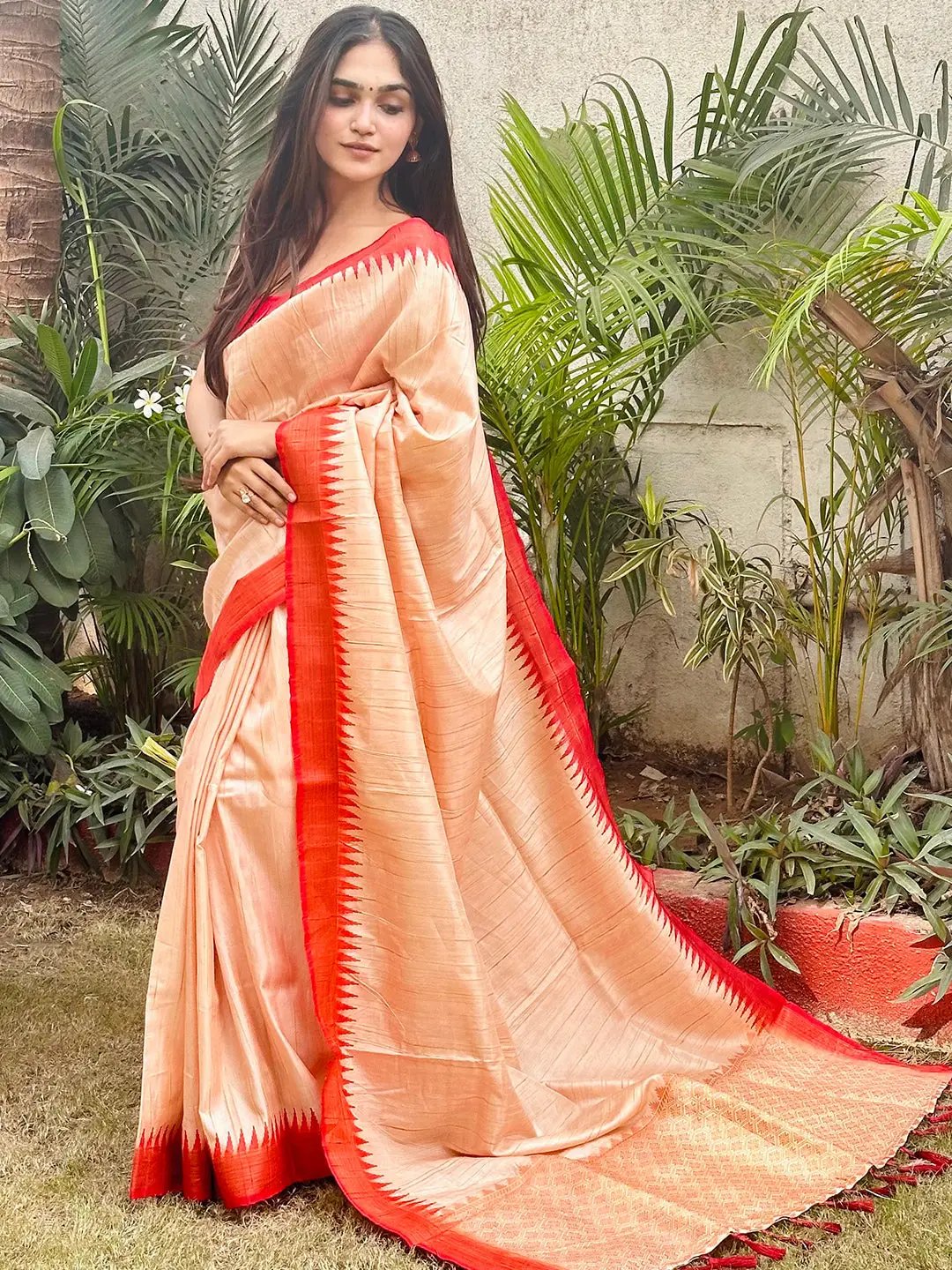Traditional Peach Silk Saree with Intricate Zari Border