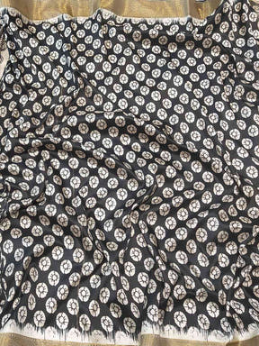 Close-up of Kalamkari saree with floral block print design