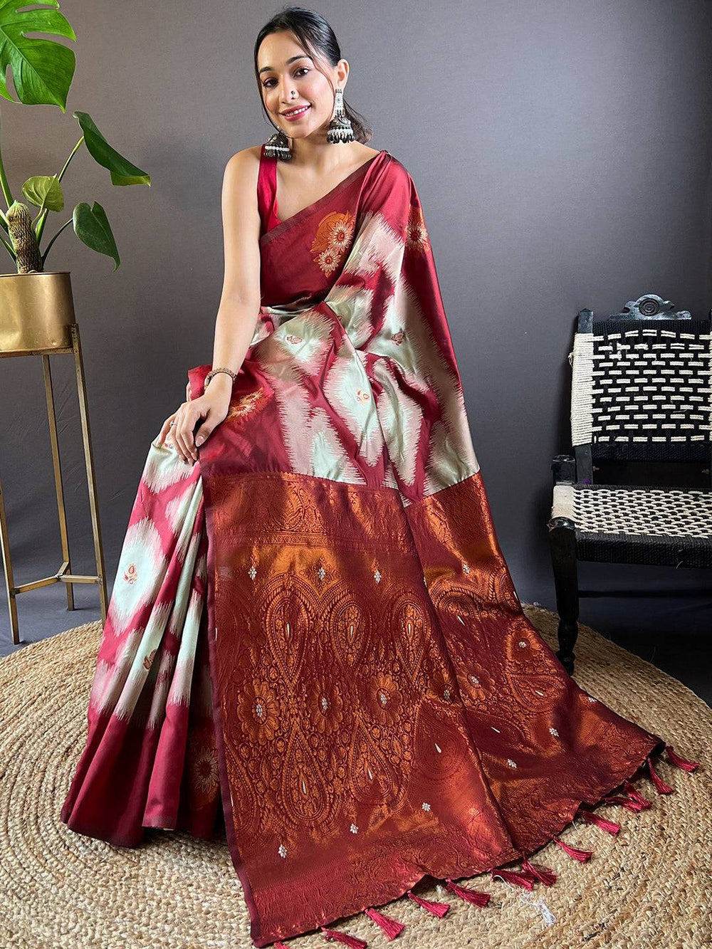 Maroon Tussar Silk Saree with detailed Ikkat Weaving pattern