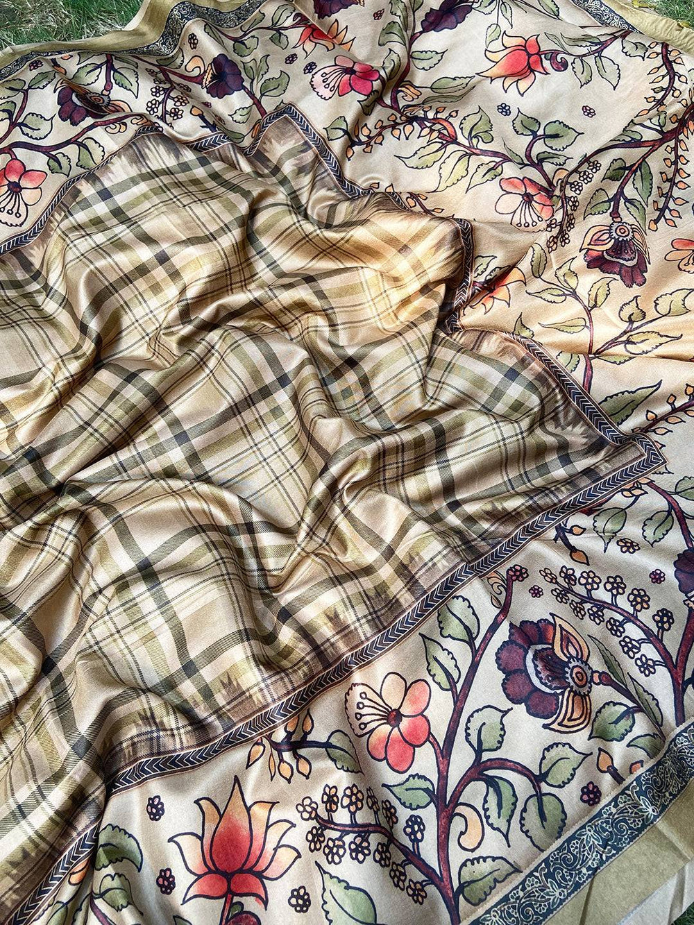 Elegant tussar silk saree featuring floral kalamkari motifs