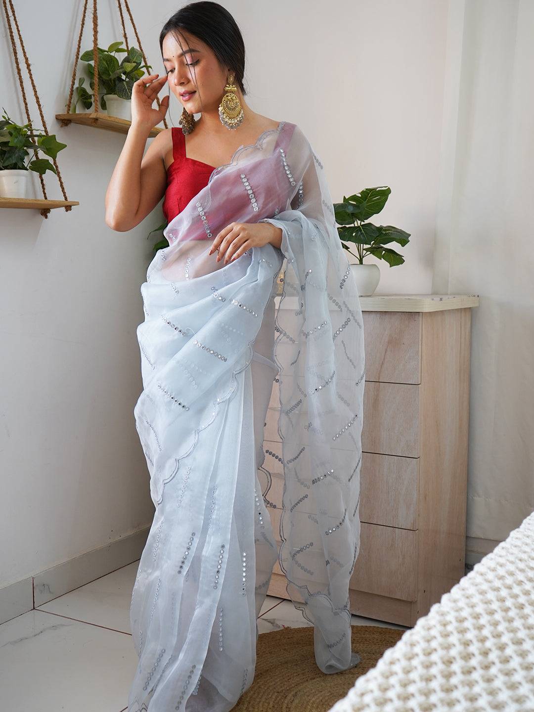 Sky Blue Organza Saree with Sequence and Cutwork Border
