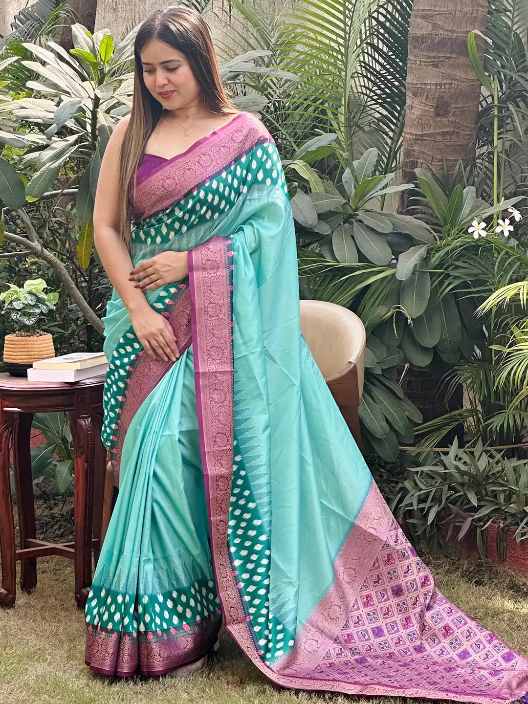 Graceful Banarasi soft silk saree with detailed Patola pallu design.