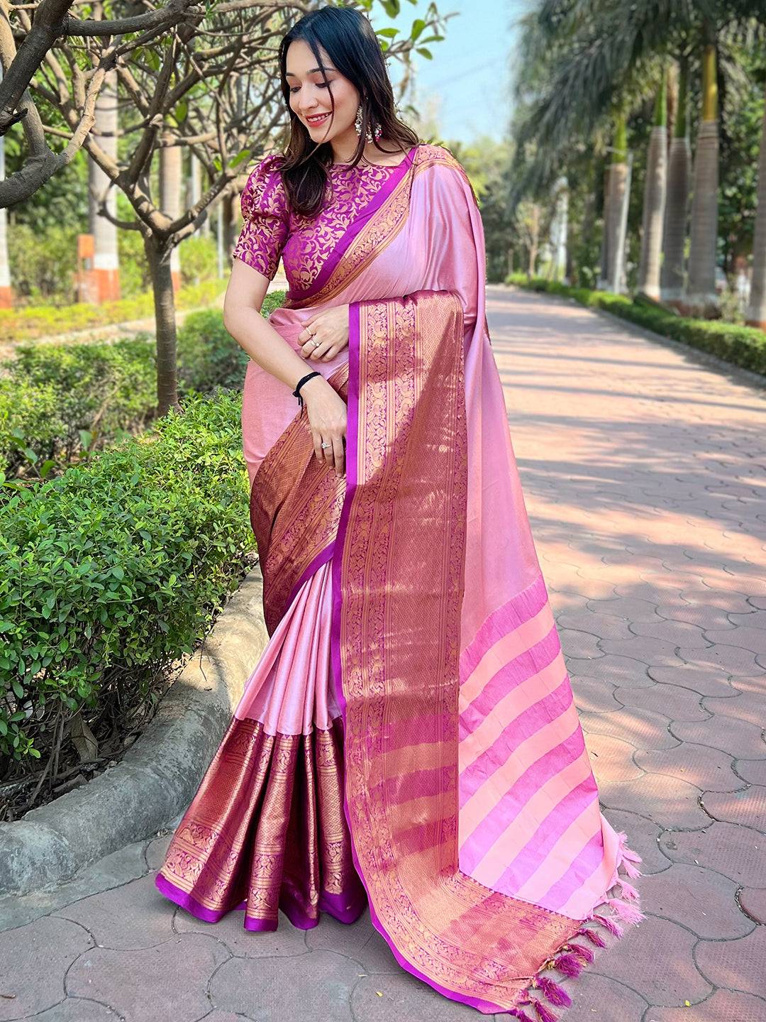 Elegant pink Kanjivaram saree with gold weaving details