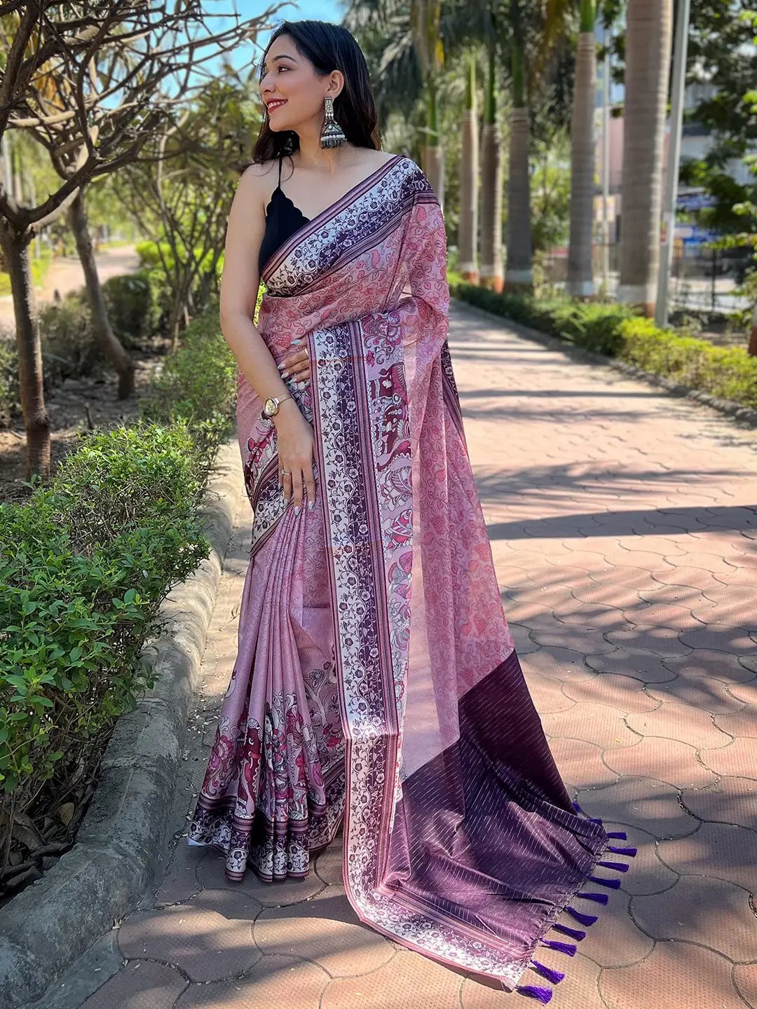 Pink Satin Kota Doria Saree with Kalamkari Print, outdoor setting